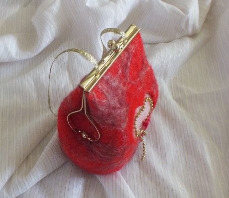 Valentines small red felter purse with metal golden frame.