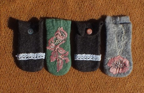 Four felted reading glasses cases or mobile cases